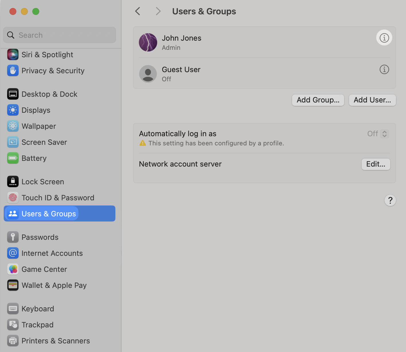 macOS System Settings Users & Groups page showing the info icon next to the user name that needs to be clicked to access user details