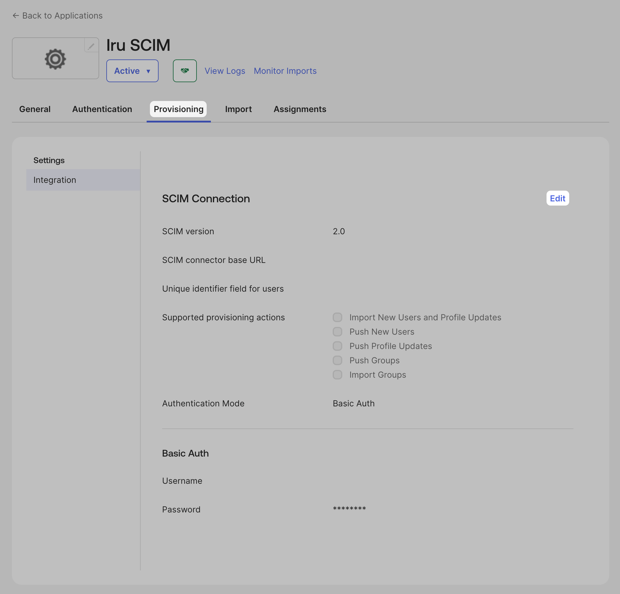 Okta Provisioning tab with SCIM Connection and Edit button