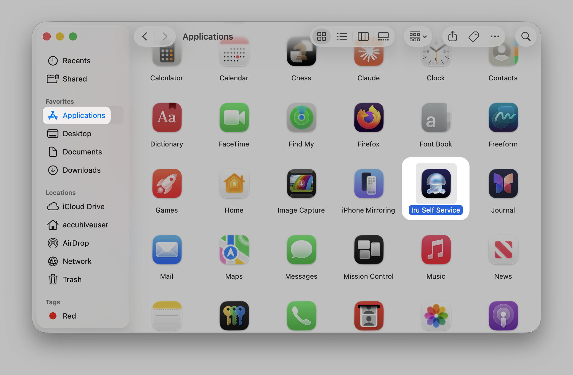 Finder Applications folder showing Iru Self Service app to double-click and launch