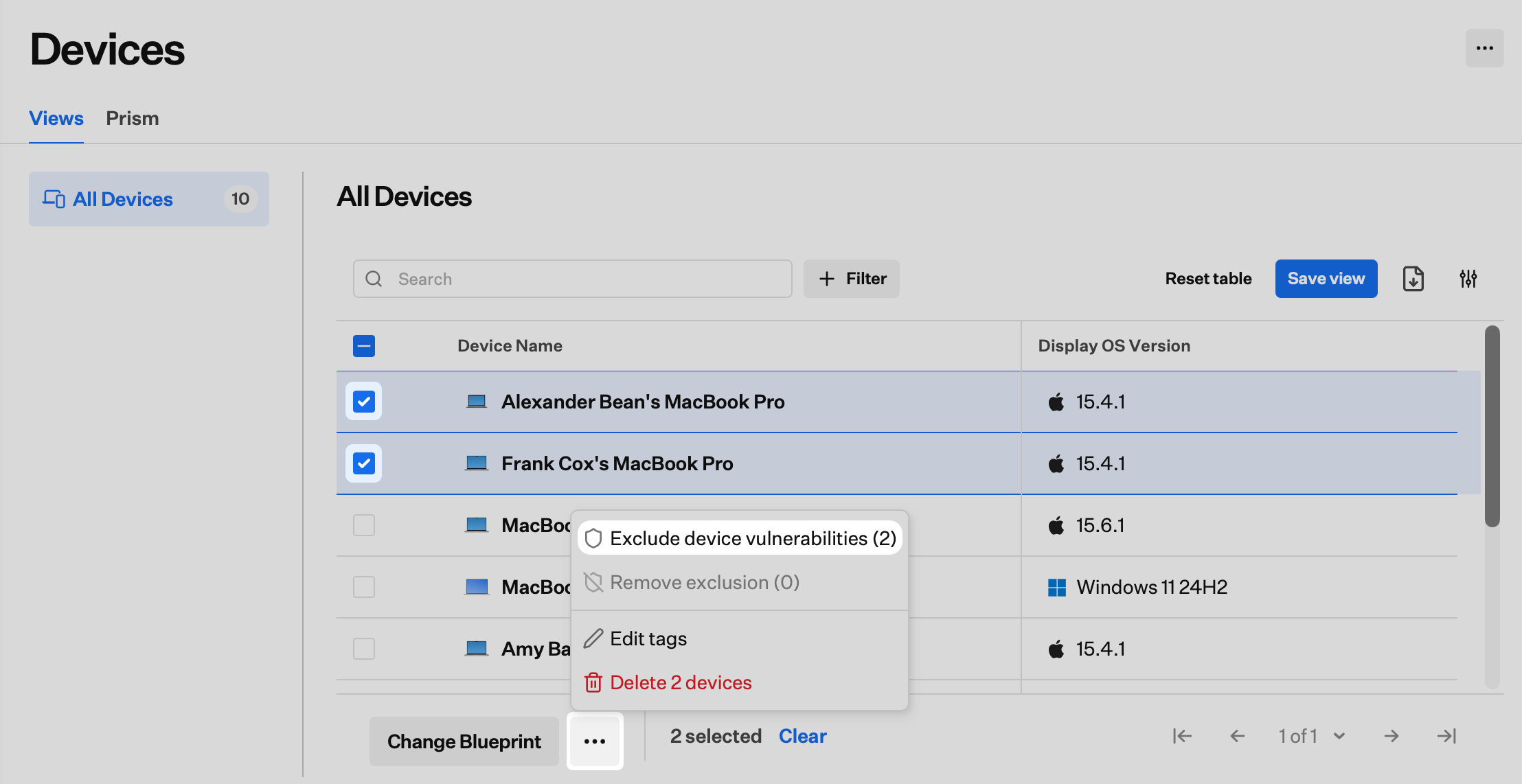Devices page with multiple devices selected and Exclude device vulnerabilities in the bulk action menu