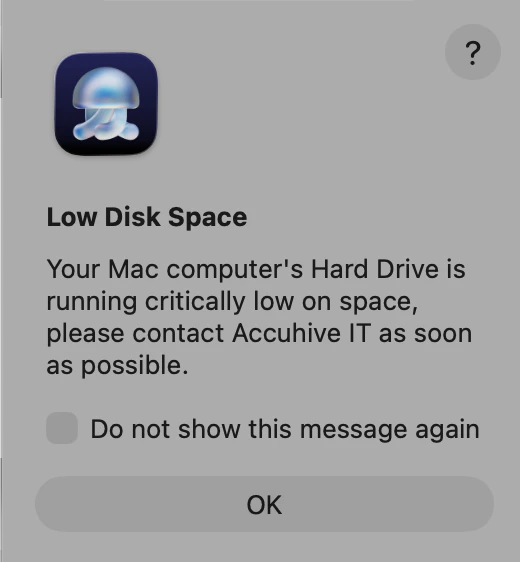 Alert dialog on macOS Tahoe showing Low Disk Space title, warning message, Help button, and OK after running the display-alert command