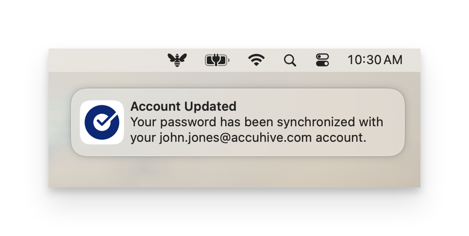 Okta Desktop Password Sync success notification confirming that the password has been synchronized successfully through System Settings