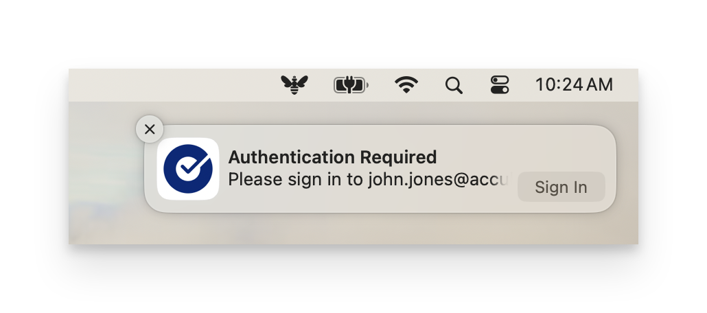 Okta Desktop Password Sync authentication required notification showing the Sign In button for password updates
