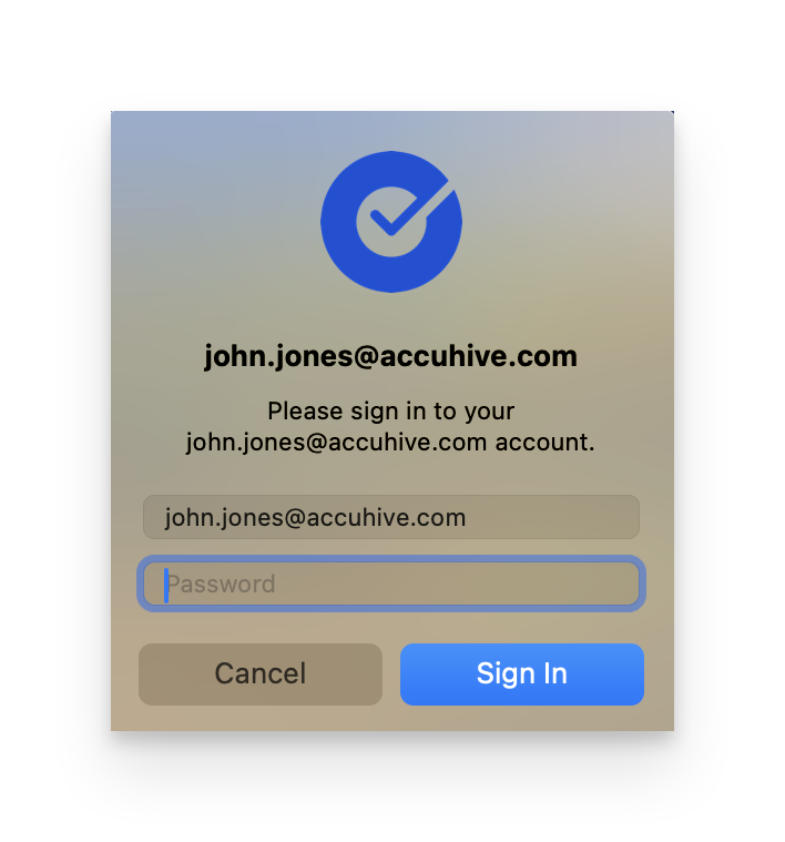 macOS password prompt dialog showing the password field where users need to enter their new Okta password for synchronization