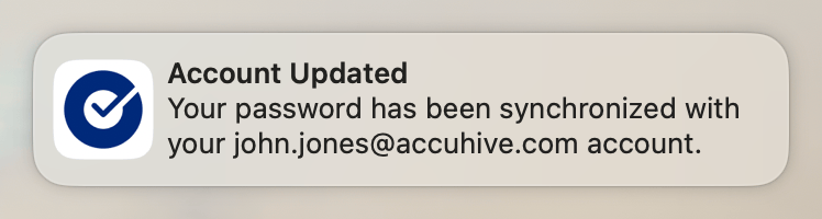 Okta Desktop Password Sync success notification confirming that the password has been synchronized successfully through System Settings