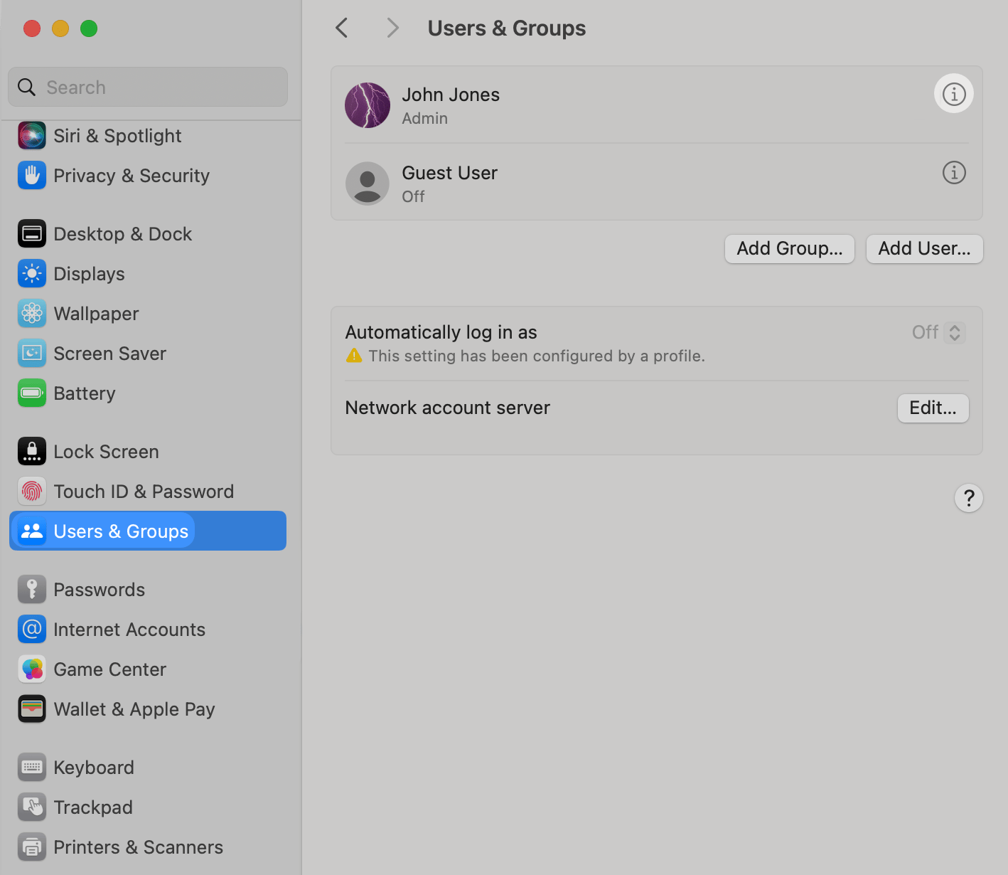 macOS System Settings Users & Groups page showing the info icon next to the user name that needs to be clicked to access user details