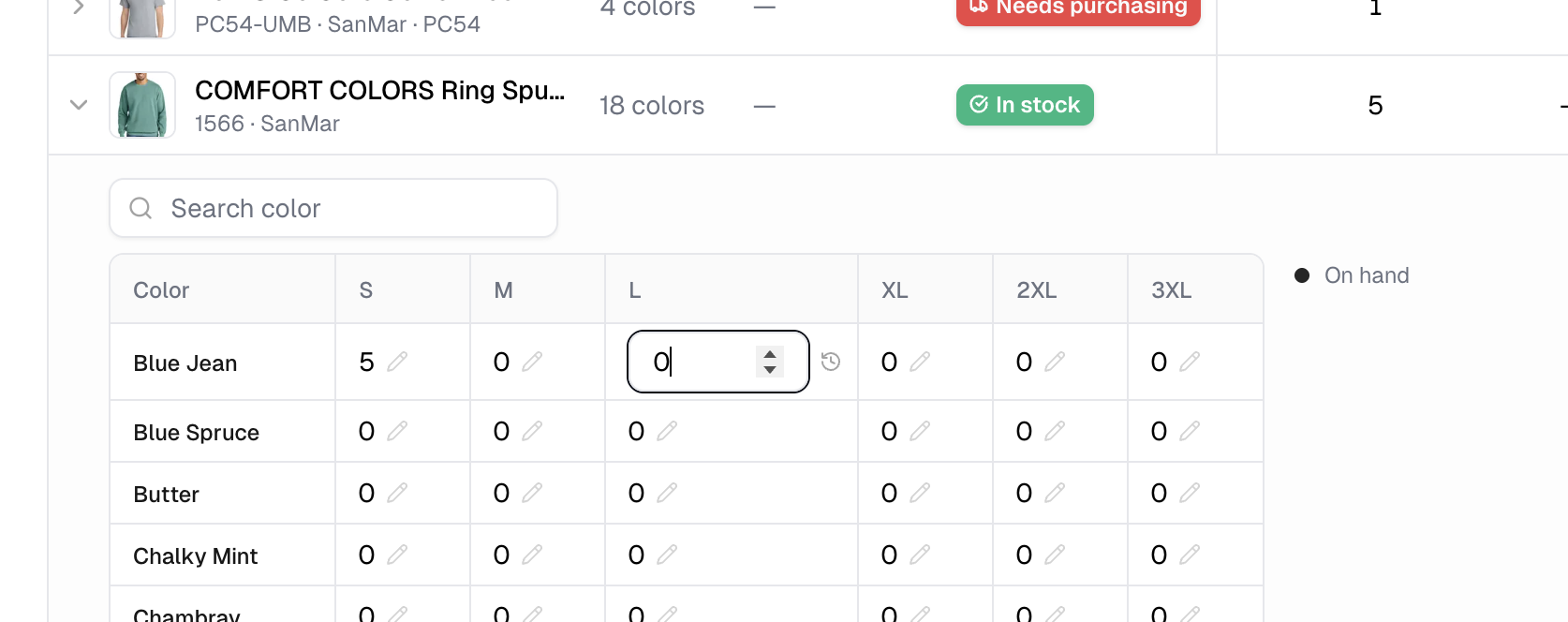 A quantity cell in edit mode, with its number input and the stock history icon beside it