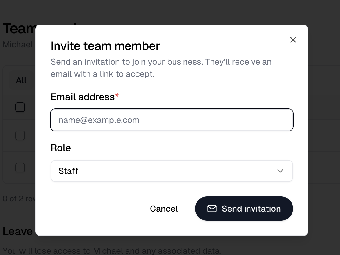 The Invite team member dialog with its email address field and role selector