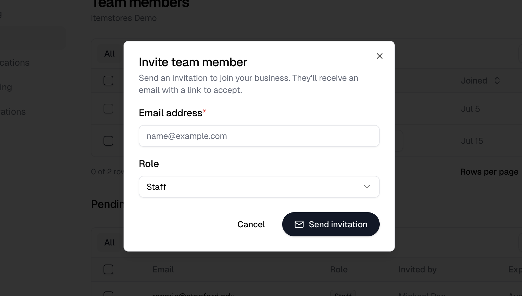 The Invite team member dialog with an email field and a Role selector set to Staff