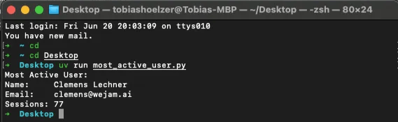 Terminal output: the most active user's name, email, and session count