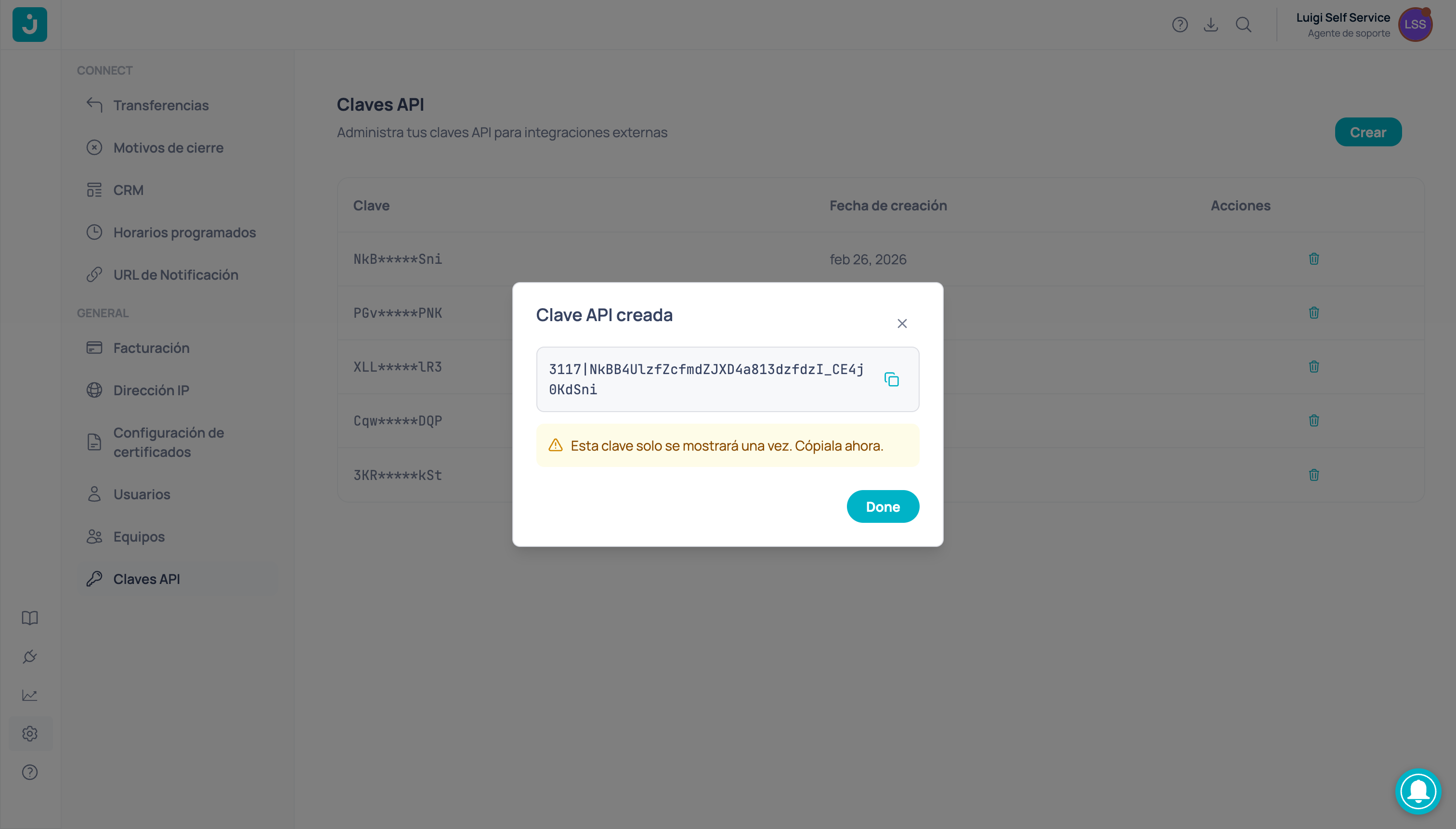 Diálogo mostrando la clave API recién creada con botón de copiar y advertencia de visibilidad única