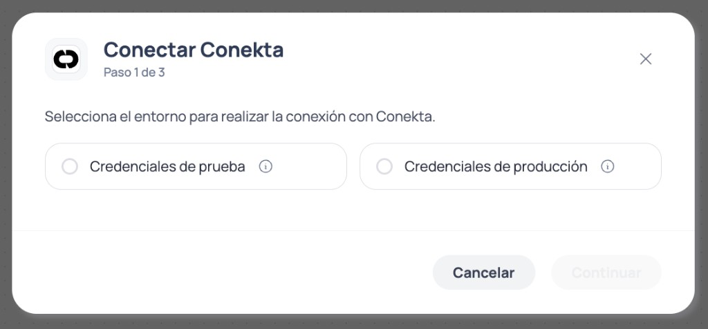 Brain Studio modal step 1 of 3 to choose test or production credentials when connecting Conekta