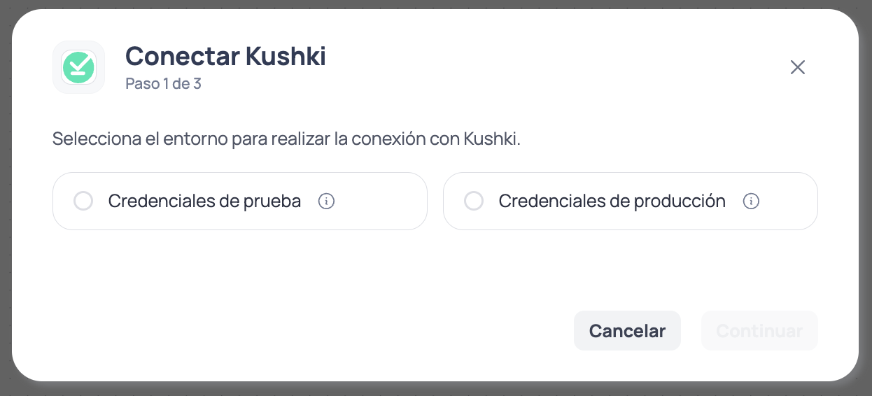 Modal de Brain Studio paso 1 de 3 para elegir credenciales de prueba o credenciales de producción al conectar Kushki