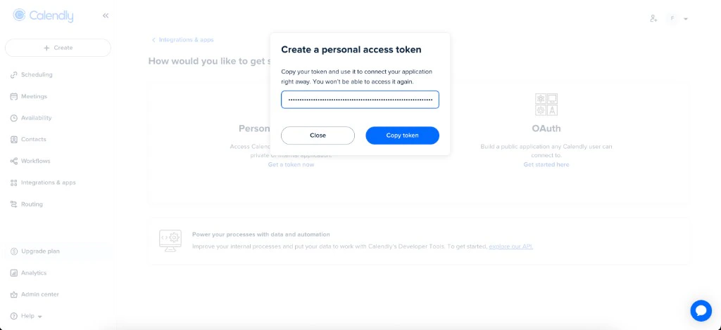 Calendly modal showing the generated personal access token and the Copy token button