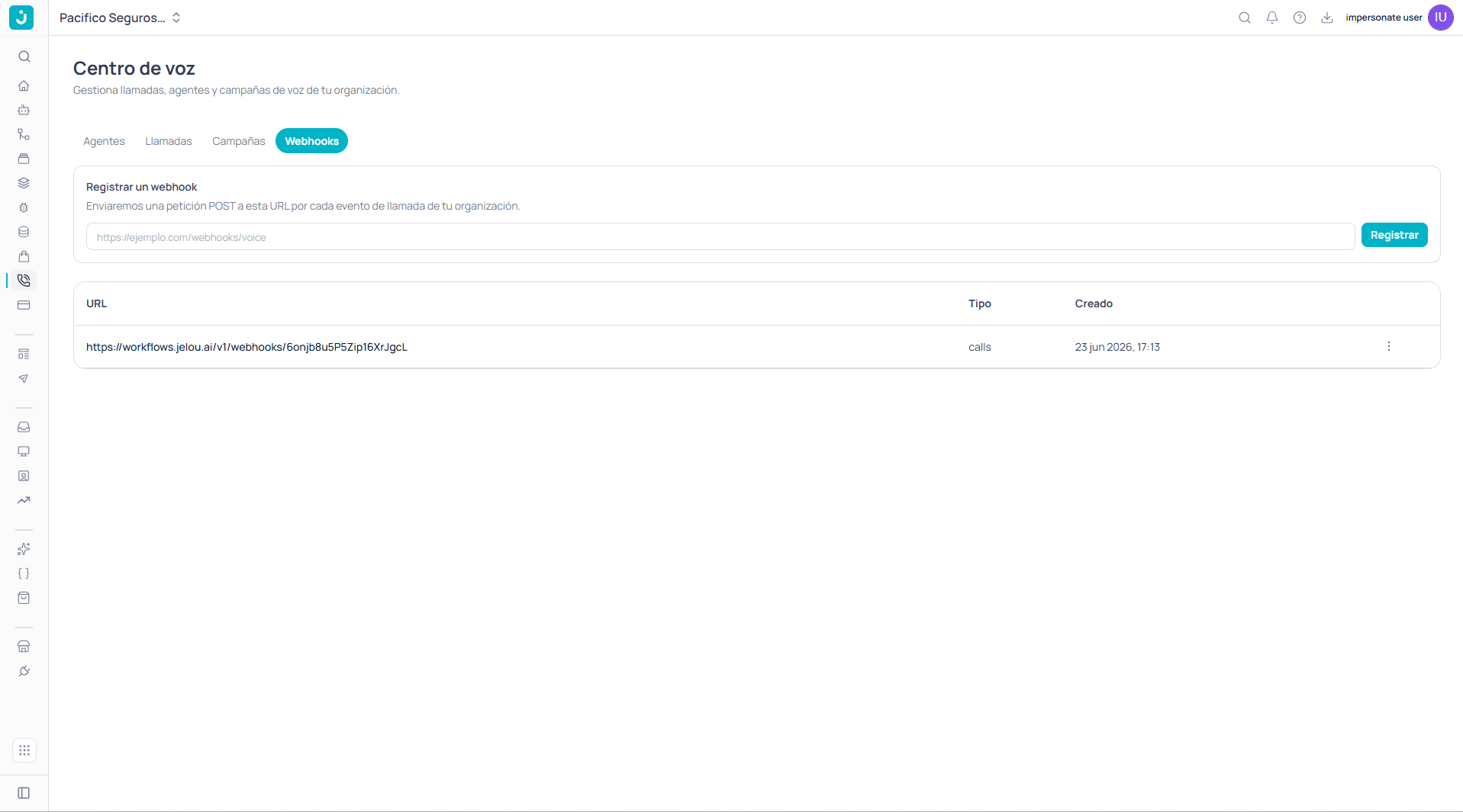 Sección Registrar un webhook con el campo de URL y el botón Registrar, y debajo la tabla de webhooks con su URL, tipo y fecha de creación