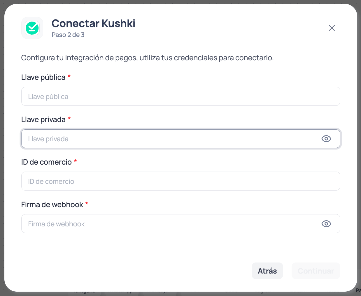 Modal de Brain Studio paso 2 de 3 para ingresar llave pública, llave privada, ID de comercio y firma de webhook