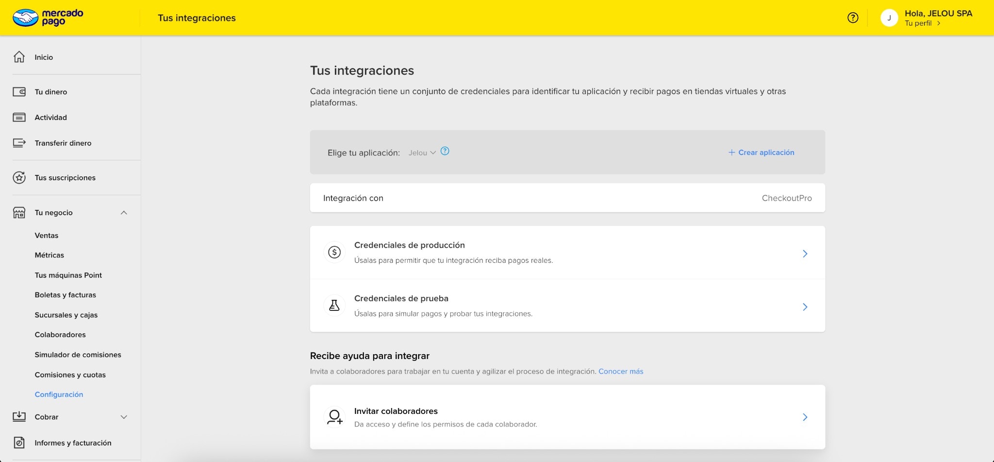 Dashboard Mercado Pago mostrando Tus integraciones, selector de aplicación Jelou y las tarjetas Credenciales de producción y Credenciales de prueba