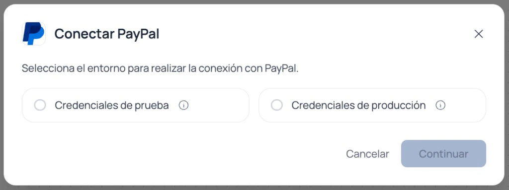 Modal de Brain Studio para elegir entre credenciales de prueba o credenciales de producción al conectar PayPal