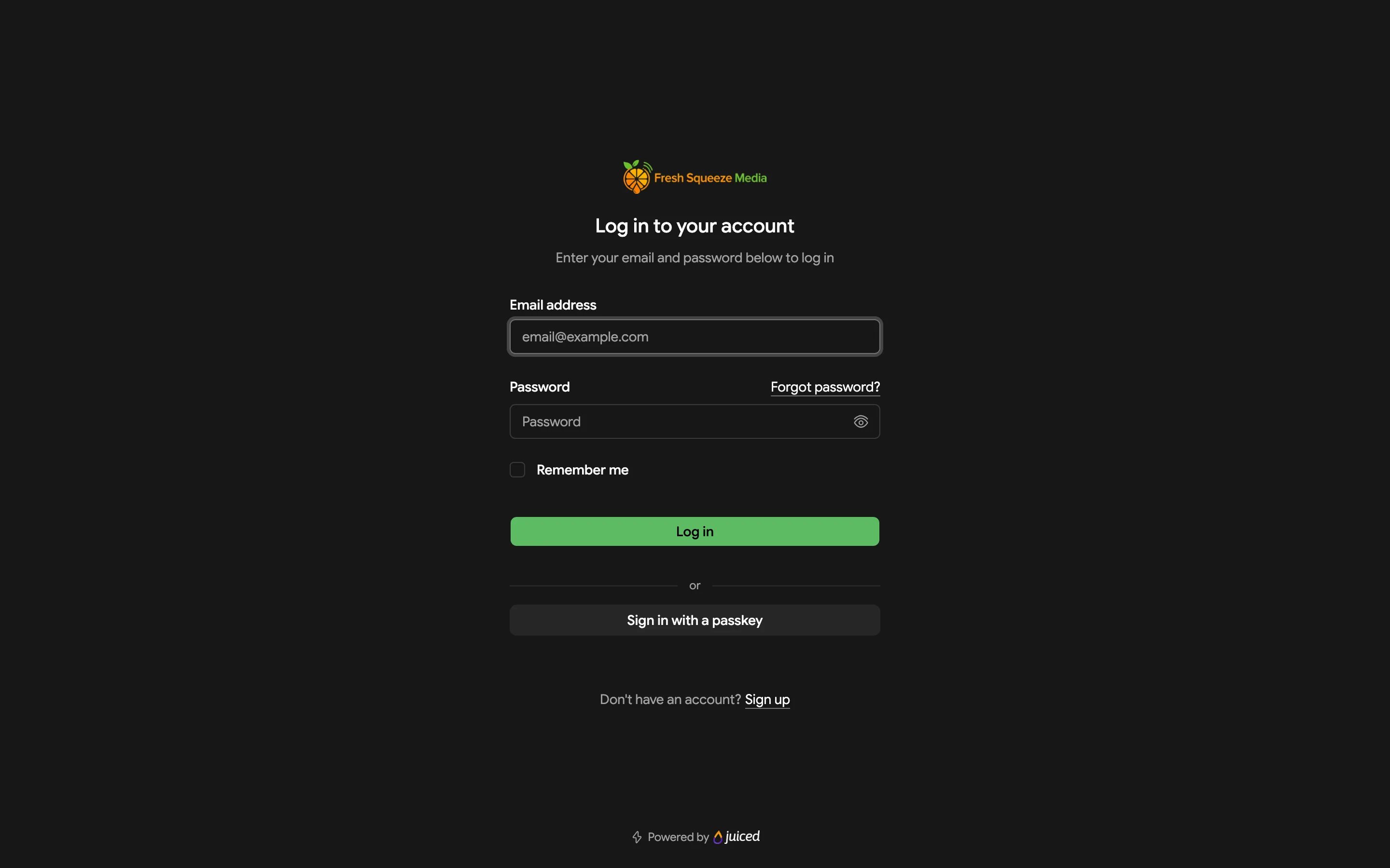 Portal login page with email address and password fields, Remember me, a Log in button, and a Sign in with a passkey button