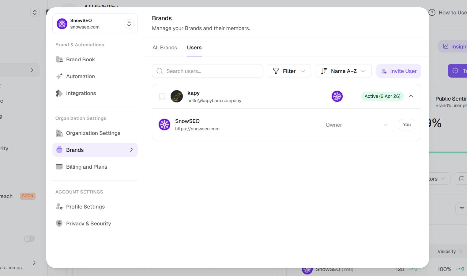 Users tab in Settings showing user and brand assignment management