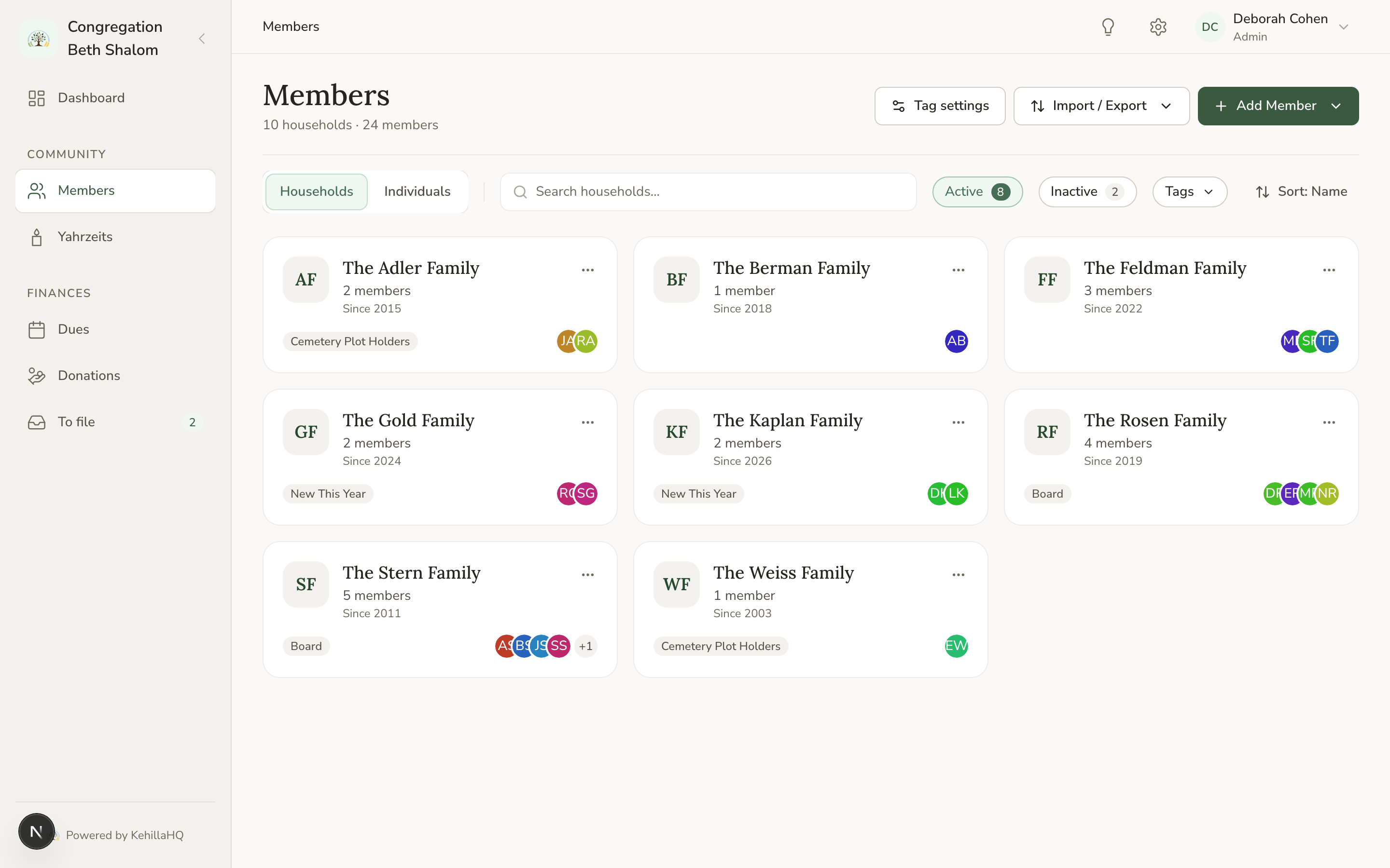 The Members page in household view, showing eight family cards with member counts and tags