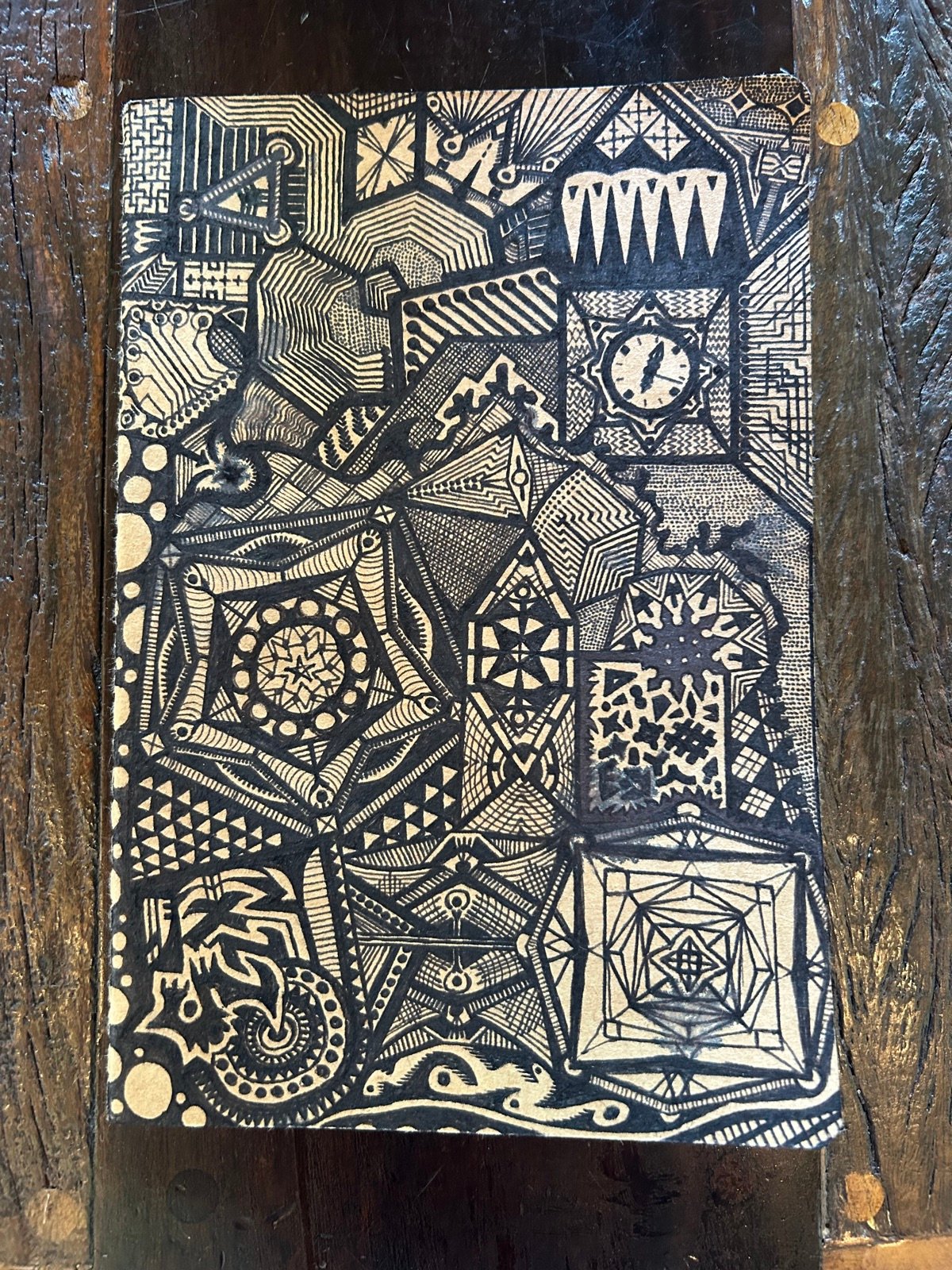 Geometric pen and ink drawing on gold cardstock