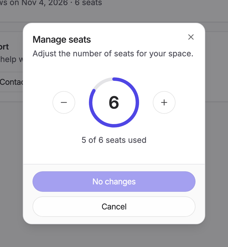 The Manage seats dialog with a seat selector and the number of seats in use
