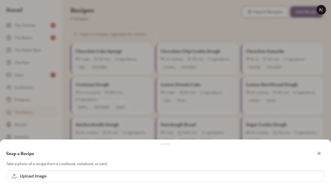 Snap a Recipe capture sheet with Upload Image button overlaying the recipes grid