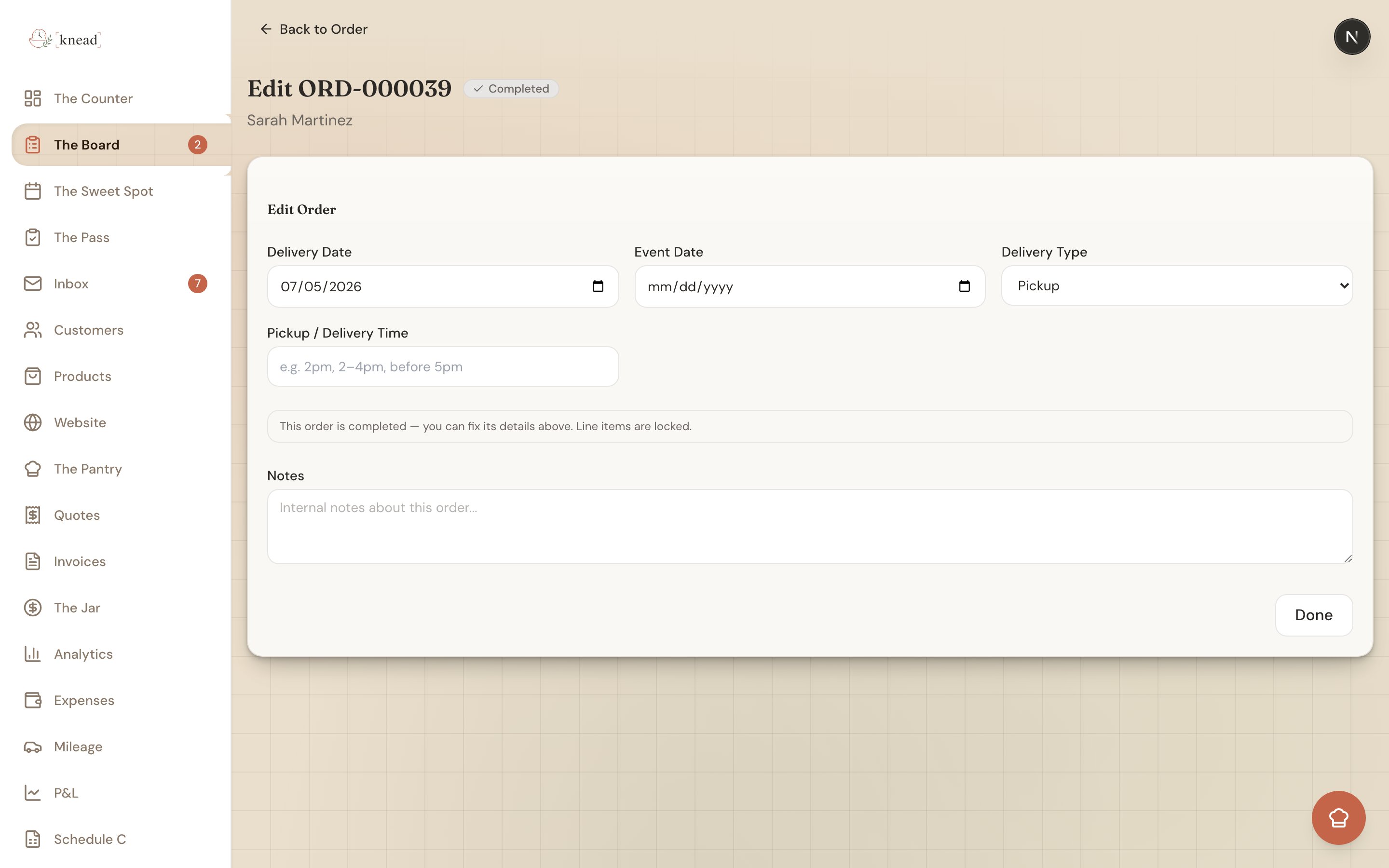 A completed order's edit view with header details still editable and a note that line items are locked