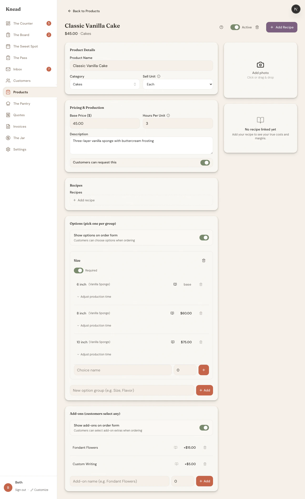 Product detail page showing Options section with Size group (6 inch, 8 inch, 10 inch at different prices) and Add-ons section with Fondant Flowers and Custom Writing