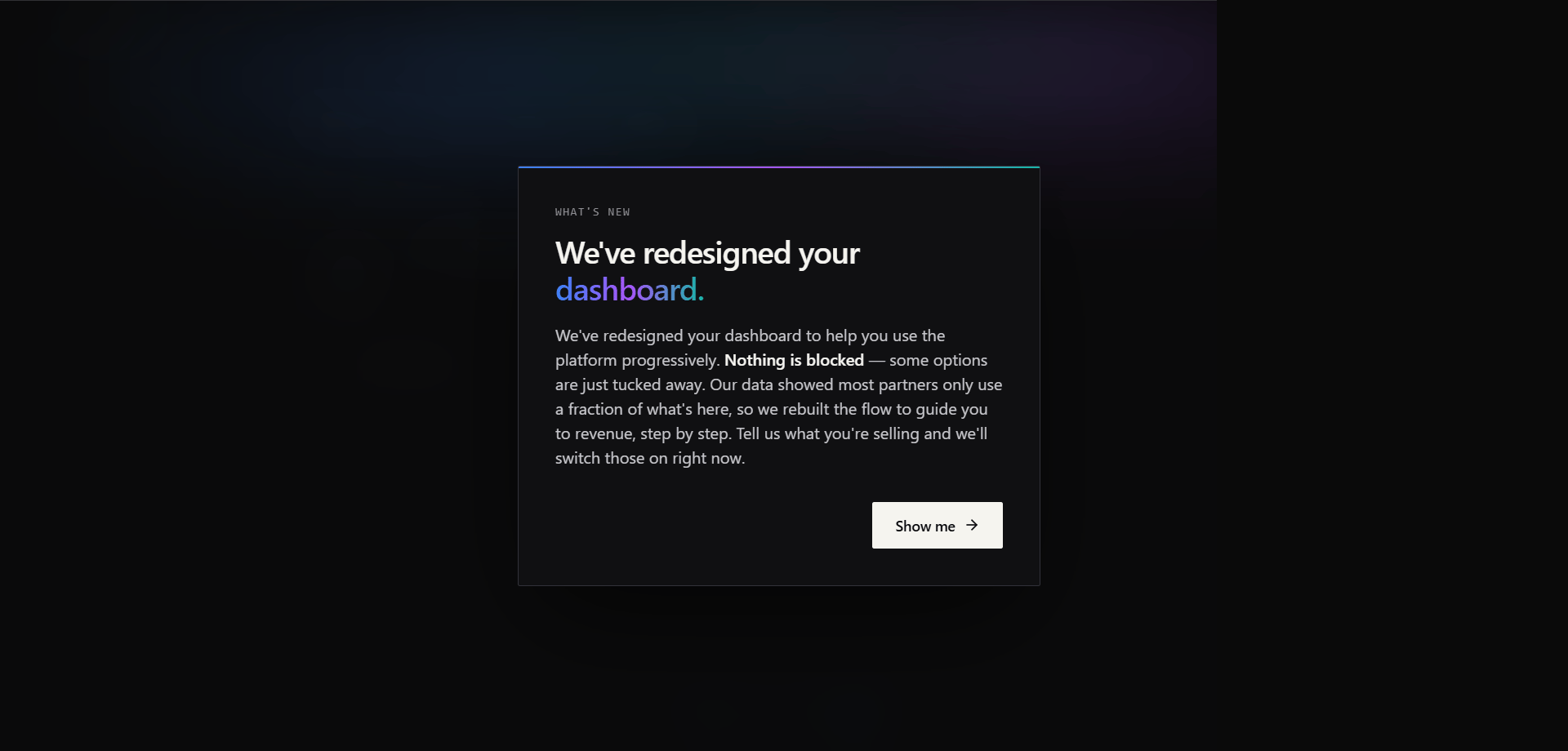 Introductory "What's New" modal on first login — announces the redesigned dashboard and explains the progressive feature approach, with a "Show me" button to continue