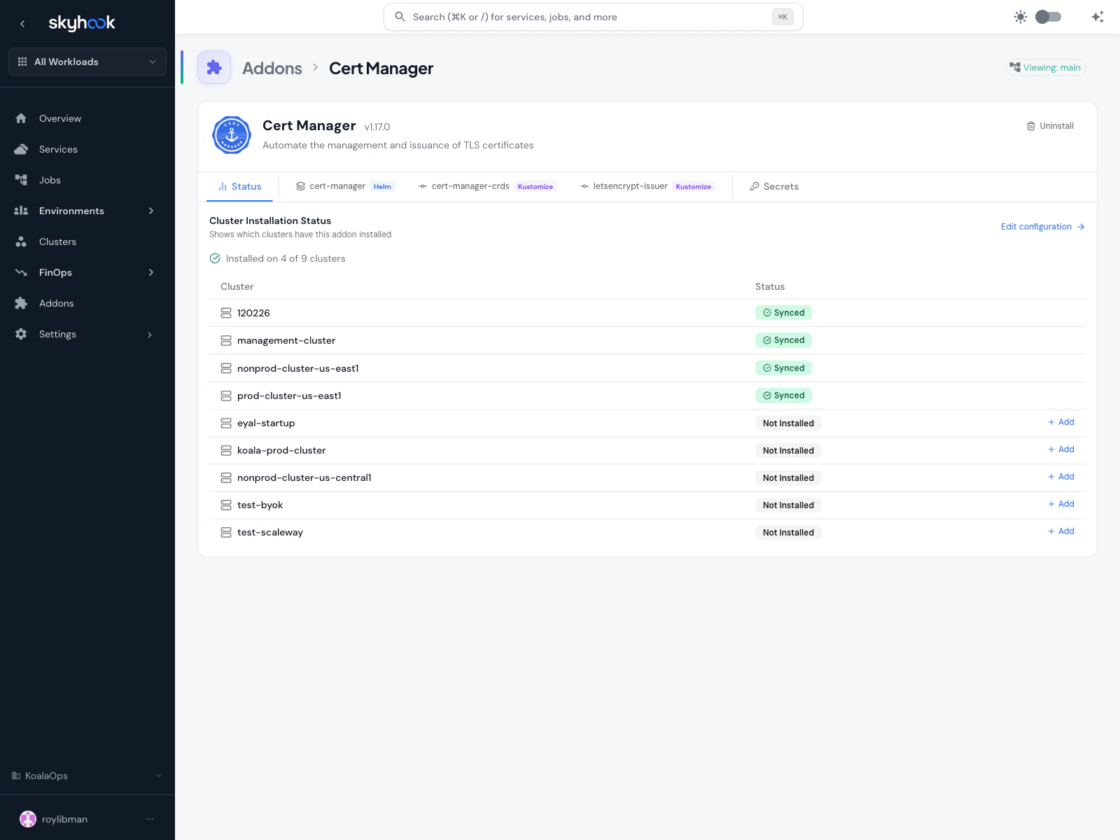 Addon detail page for Cert Manager showing the flat tab row - Status, cert-manager Helm, cert-manager-crds Kustomize, letsencrypt-issuer Kustomize, Secrets - and a cluster installation status table with Configured and Not Installed states