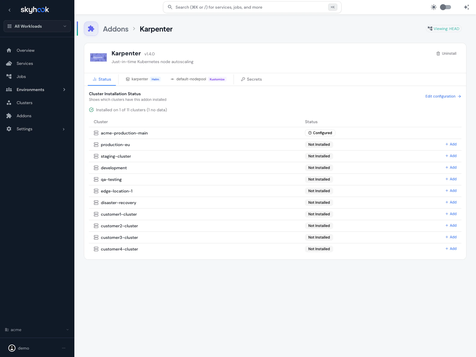 Karpenter addon detail page showing Cluster Installation Status with one installed cluster (acme-production-main) and Add buttons for other AWS clusters