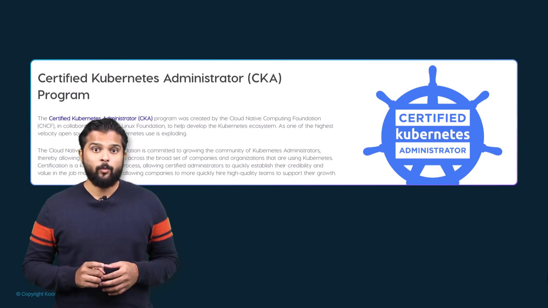 A presenter stands in front of a slide titled "Certified Kubernetes Administrator (CKA) Program" with explanatory text and a large blue "Certified Kubernetes Administrator" logo on the right. The speaker faces the camera wearing a dark sweater with orange stripes.