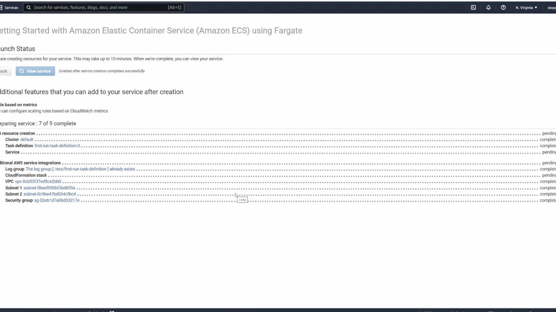 A screenshot of the AWS Management Console showing the "Getting Started with Amazon Elastic Container Service (Amazon ECS) using Fargate" launch status and progress, with a list of resources being created (cluster, task definition, service) and related AWS integrations like VPC, subnets, and security group. The page indicates several items completed and some still pending.