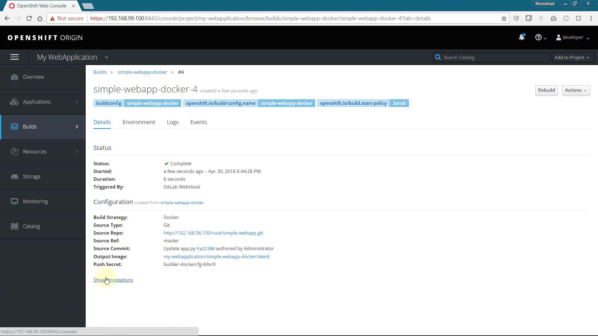 A screenshot of the OpenShift Origin web console showing the "My WebApplication" project and the build details for "simple-webapp-docker-4." The page shows build status as "Complete" along with configuration and source repository information.