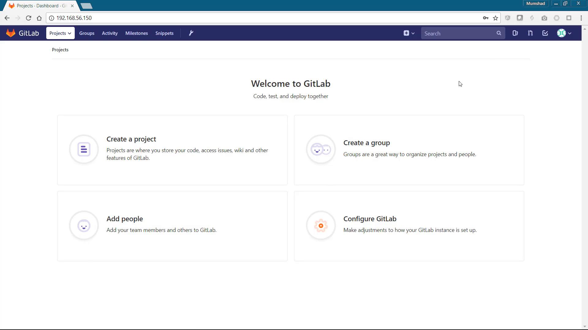 A screenshot of the GitLab web dashboard showing a "Welcome to GitLab" page with tiles for Create a project, Create a group, Add people, and Configure GitLab. The browser address bar shows a local IP address (192.168.56.150).