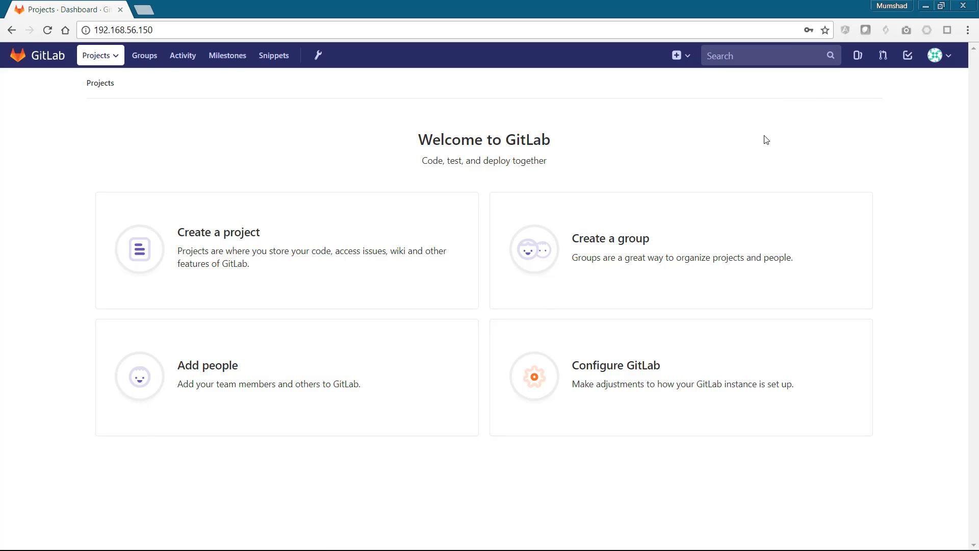 A screenshot of the GitLab web dashboard showing a "Welcome to GitLab" page with tiles for Create a project, Create a group, Add people, and Configure GitLab. The browser address bar shows a local IP address (192.168.56.150).