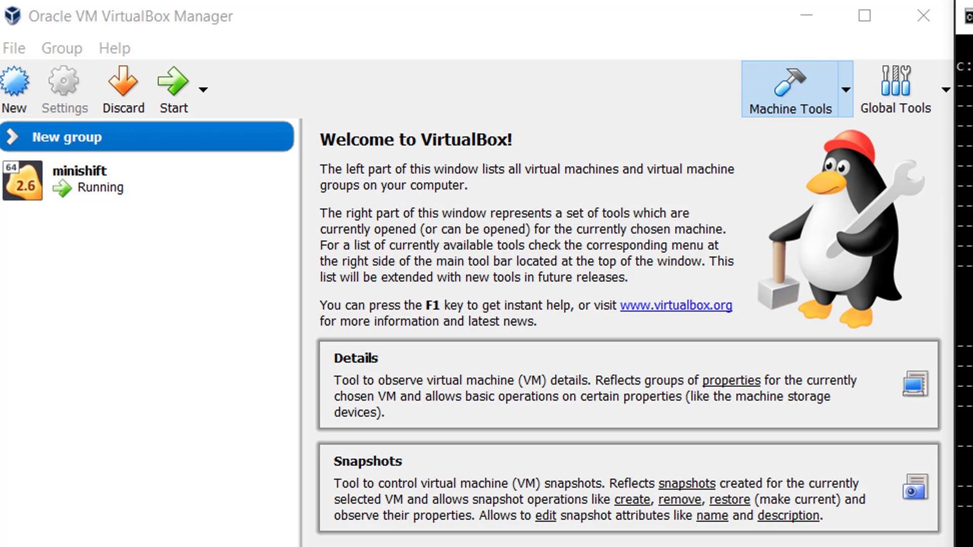 Screenshot of the Oracle VM VirtualBox Manager "Welcome to VirtualBox" window featuring a penguin mascot holding a wrench and hammer. The left pane shows a virtual machine named "minishift" marked as running.