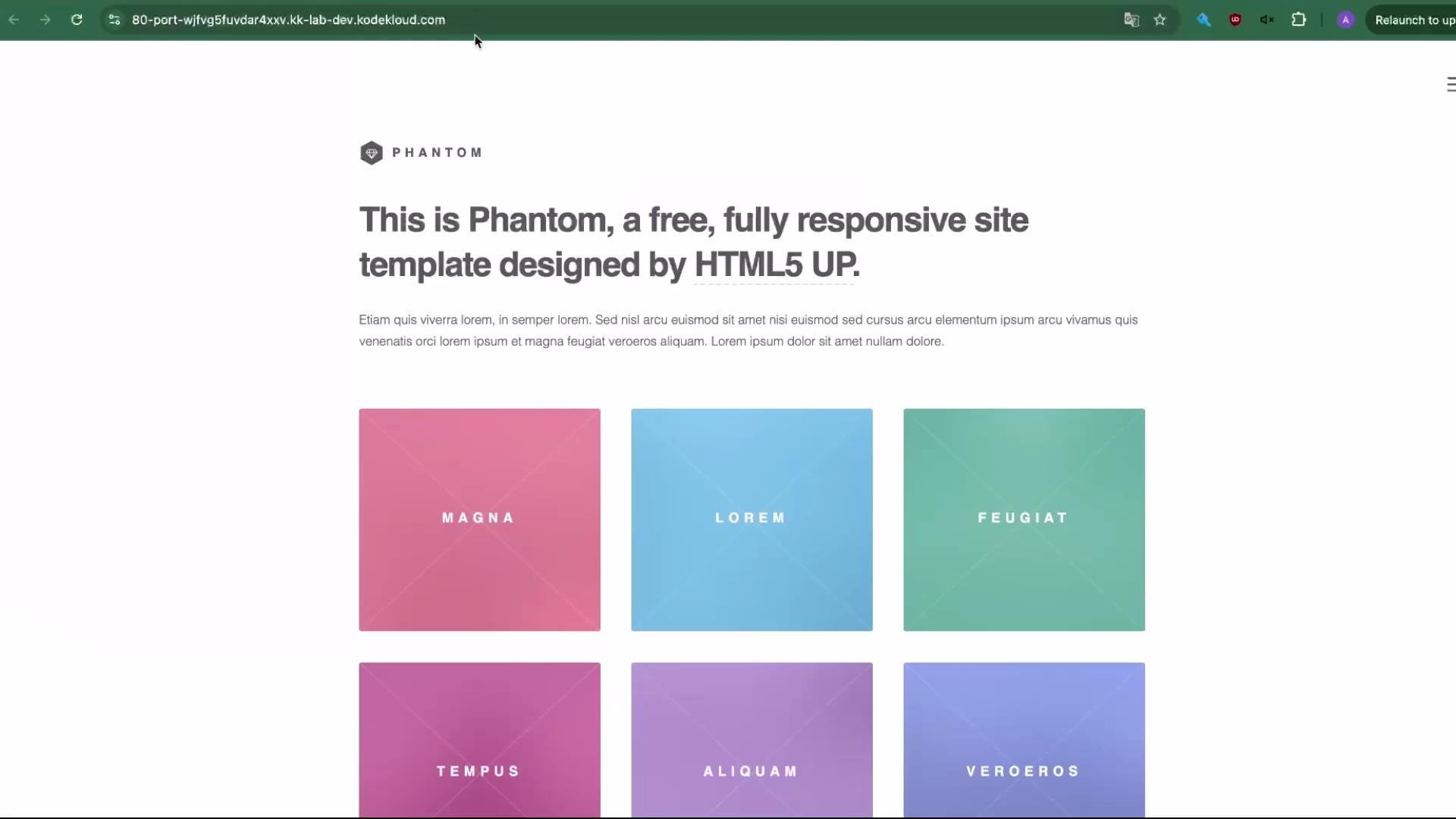 A screenshot of a clean webpage for the "Phantom" responsive site template, showing a large headline and brief paragraph beneath the logo. Below that is a grid of colorful square tiles labeled with words like "MAGNA," "LOREM," and "FEUGIAT."