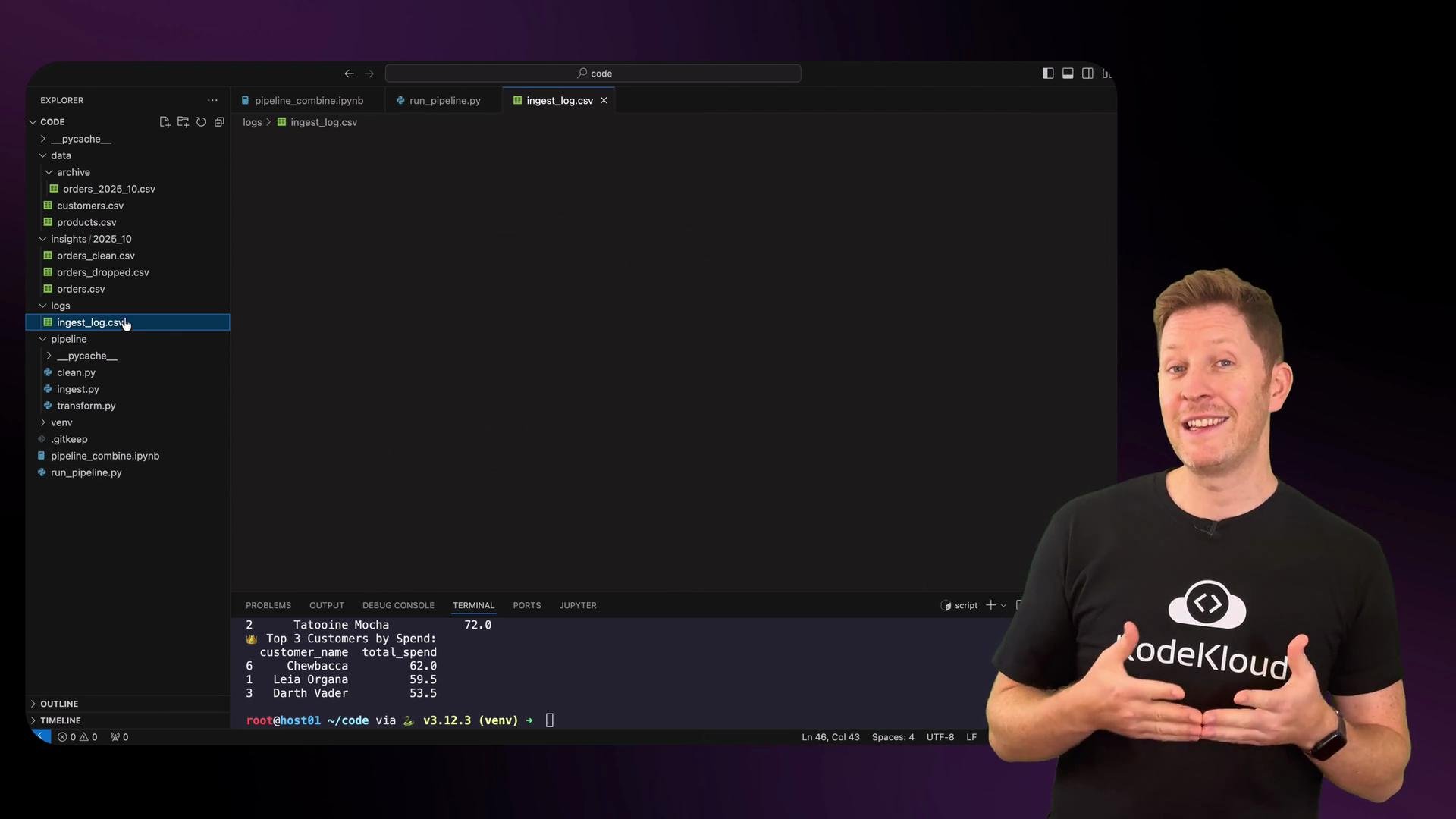 The image shows a person standing in front of a computer screen displaying a code editor with a directory structure and a terminal window. The person is wearing a shirt with a logo and appears to be explaining or demonstrating something related to the code on-screen.