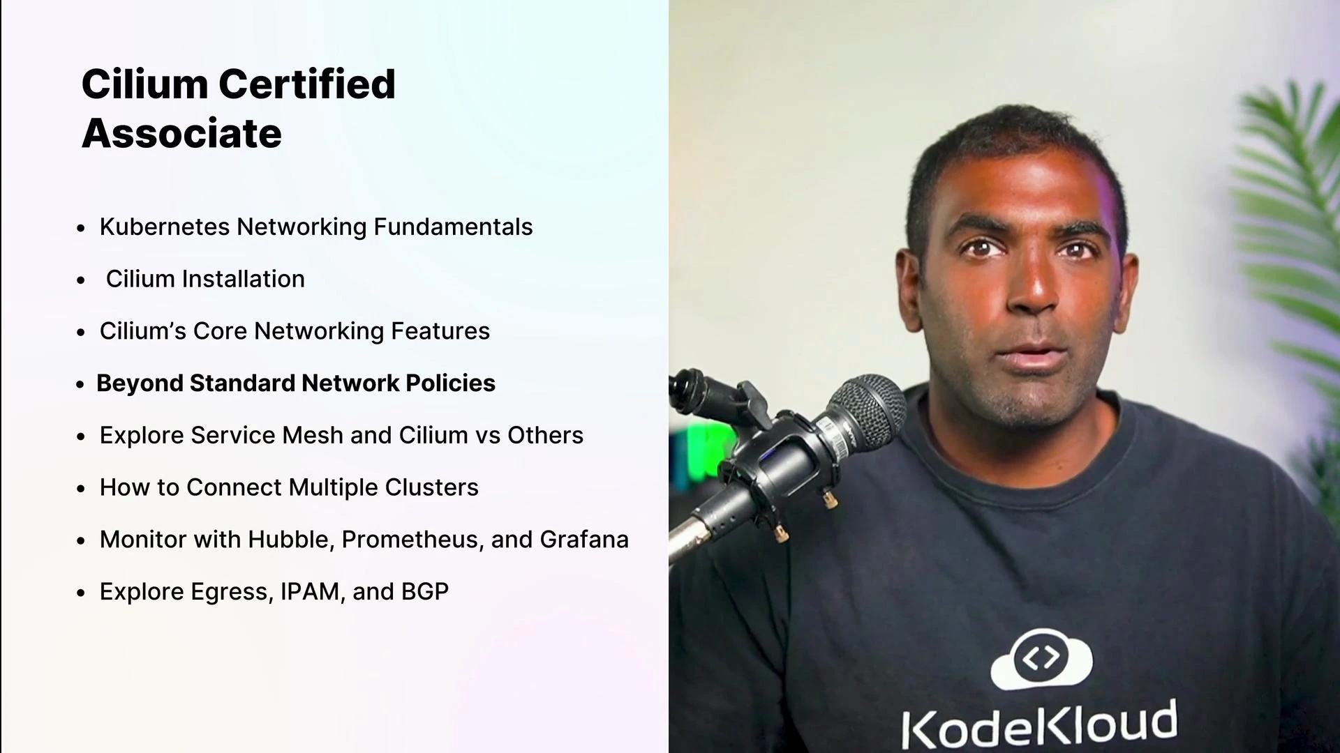 A slide titled "Cilium Certified Associate" with bullet points about Kubernetes networking and Cilium topics is shown on the left. On the right, a presenter wearing a KodeKloud shirt speaks into a microphone.
