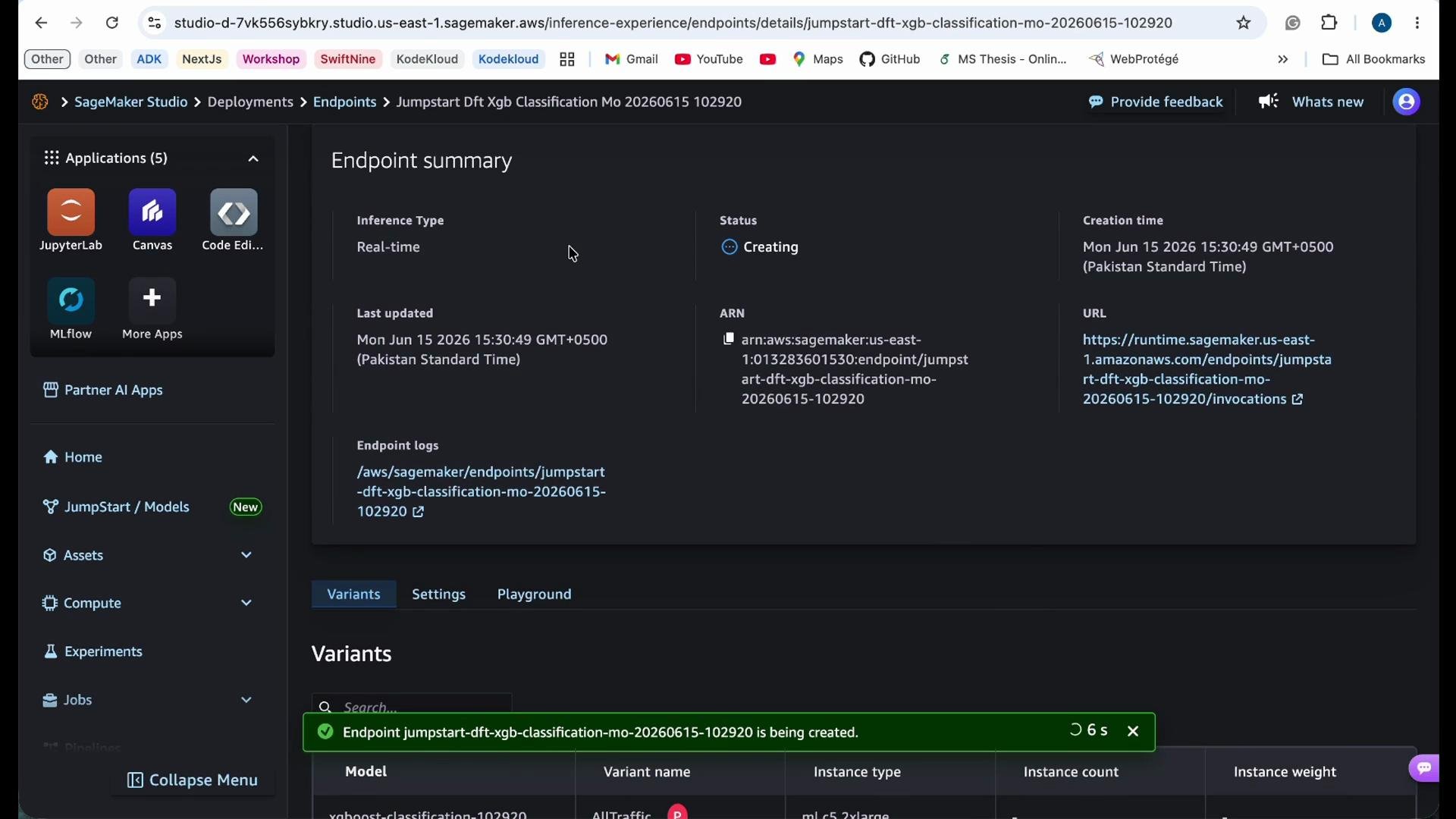 The image shows a screenshot of AWS SageMaker Studio with an endpoint summary for a classification model being created. It includes details like inference type, creation time, and endpoint URL.
