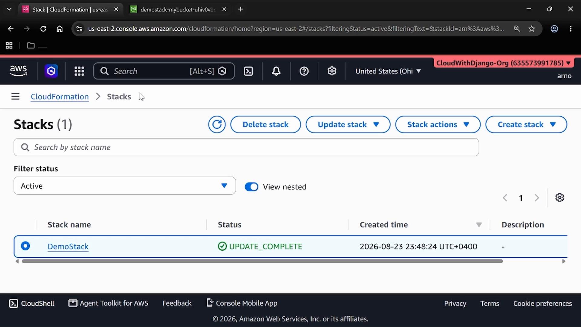 A screenshot of the AWS CloudFormation console listing one stack named "DemoStack" with status "UPDATE_COMPLETE" and a creation timestamp. The page shows CloudFormation controls (Delete/Update/Create stack) and the AWS account/region header.