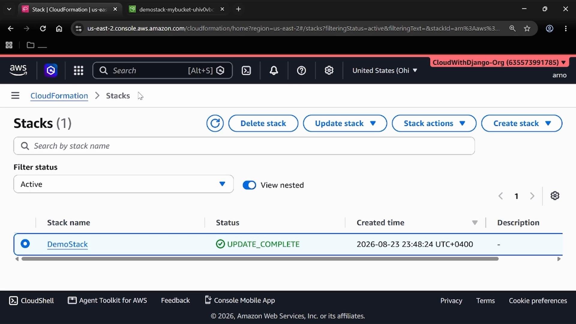 A screenshot of the AWS CloudFormation console listing one stack named "DemoStack" with status "UPDATE_COMPLETE" and a creation timestamp. The page shows CloudFormation controls (Delete/Update/Create stack) and the AWS account/region header.