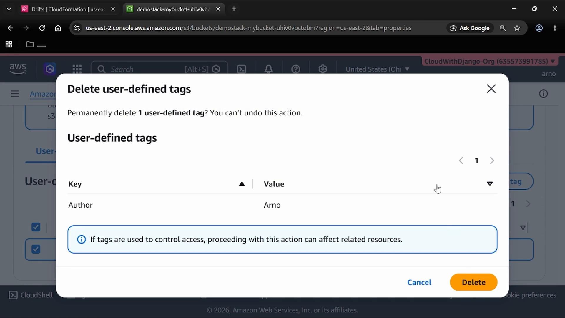 A screenshot of the AWS console showing a "Delete user-defined tags" confirmation dialog asking to permanently delete one tag. The dialog lists the tag Key "Author" with Value "Arno" and shows Cancel and Delete buttons.