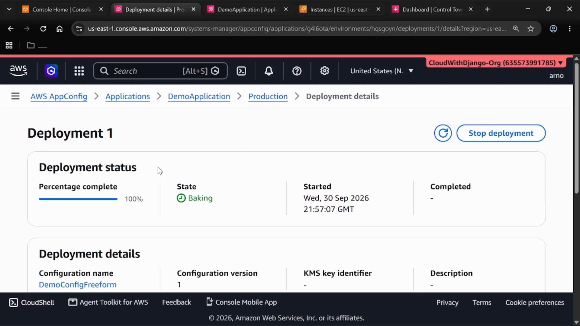 Screenshot of the AWS AppConfig console showing "Deployment 1" deployment details, with the deployment state listed as "Baking" and percentage complete at 100%. The page also shows the start time (Wed, 30 Sep 2026 21:57:07 GMT) and a "Stop deployment" button.