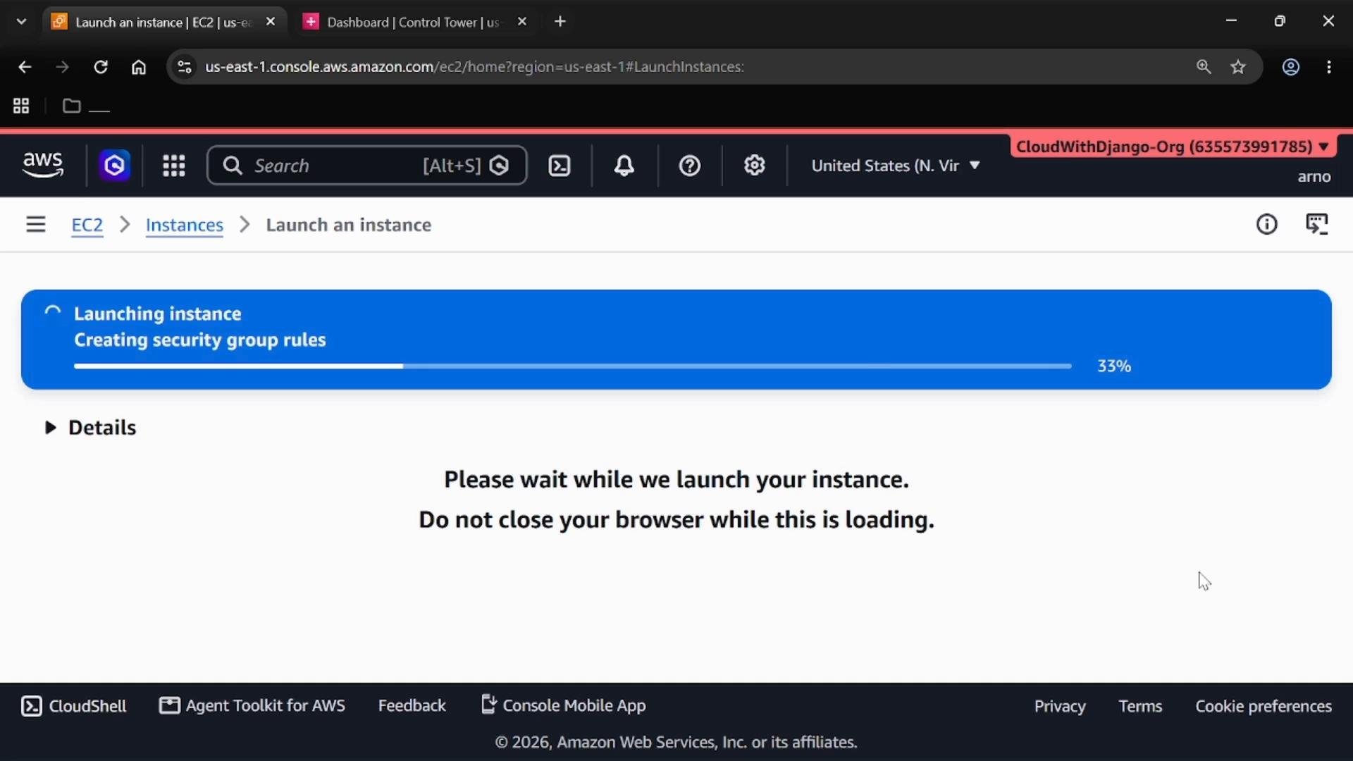A screenshot of the AWS EC2 web console showing an instance launch progress bar at 33% with the message "Creating security group rules." Below it is text asking the user to wait and not close the browser while the instance is launched.