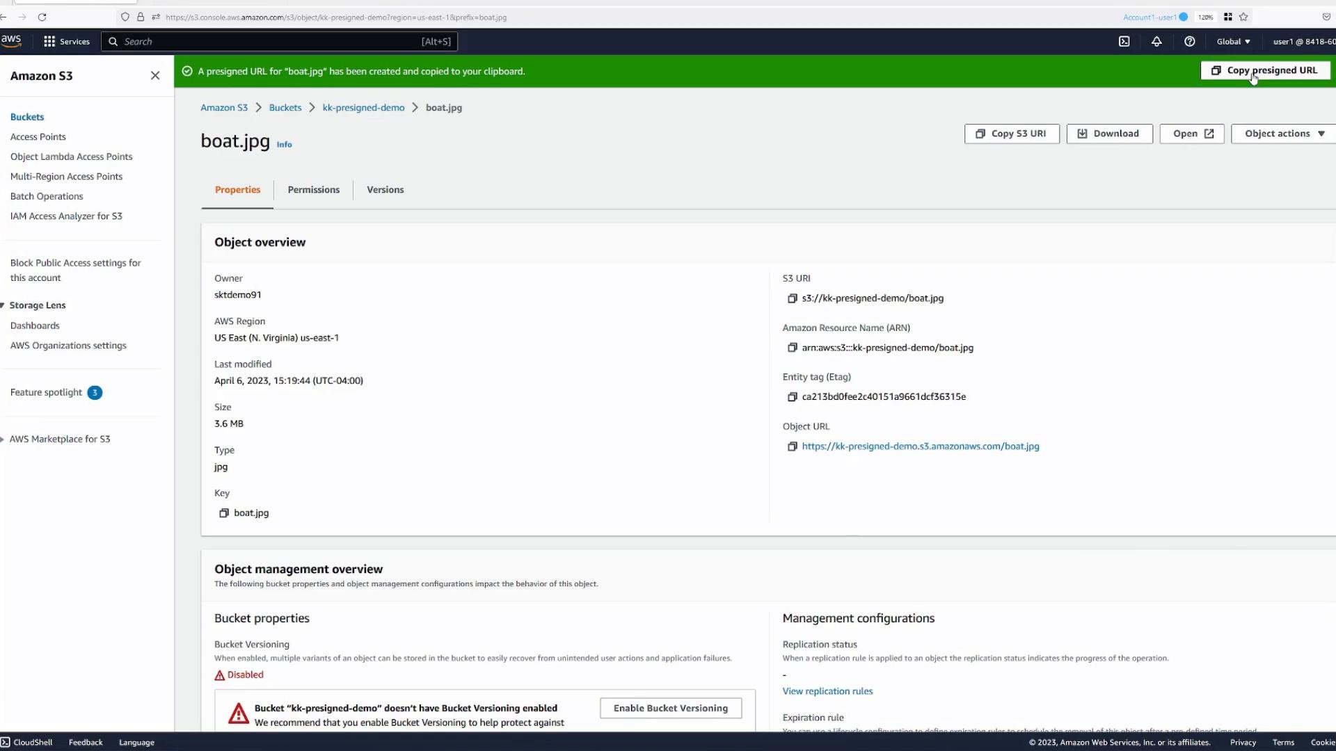 A screenshot of the Amazon S3 web console showing the object details page for "boat.jpg," including object overview, S3 URI/ARN, and management properties. A green banner at the top indicates a presigned URL was created.