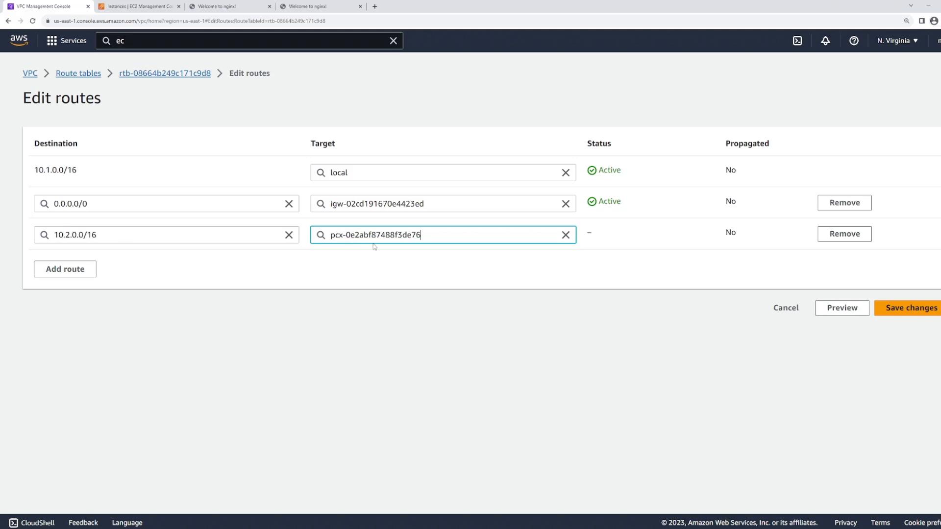 A screenshot of the AWS VPC console "Edit routes" page showing a route table with destinations 10.1.0.0/16 (local), 0.0.0.0/0 (internet gateway igw-...), and 10.2.0.0/16 (peering pcx-...). The page shows status indicators, Remove buttons, and "Preview" / "Save changes" controls at the bottom.